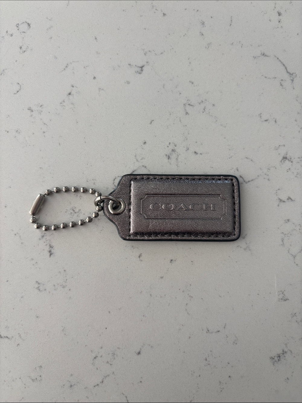 Coach Metallic Gunmetal Leather Hangtag